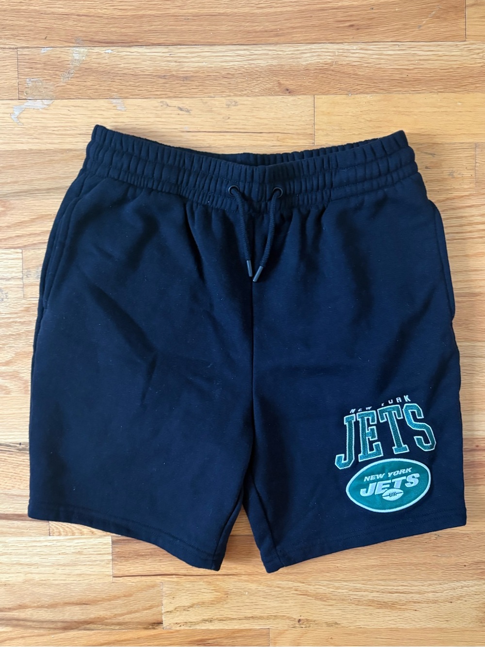 NFL football New York Jets black shorts with logo size small